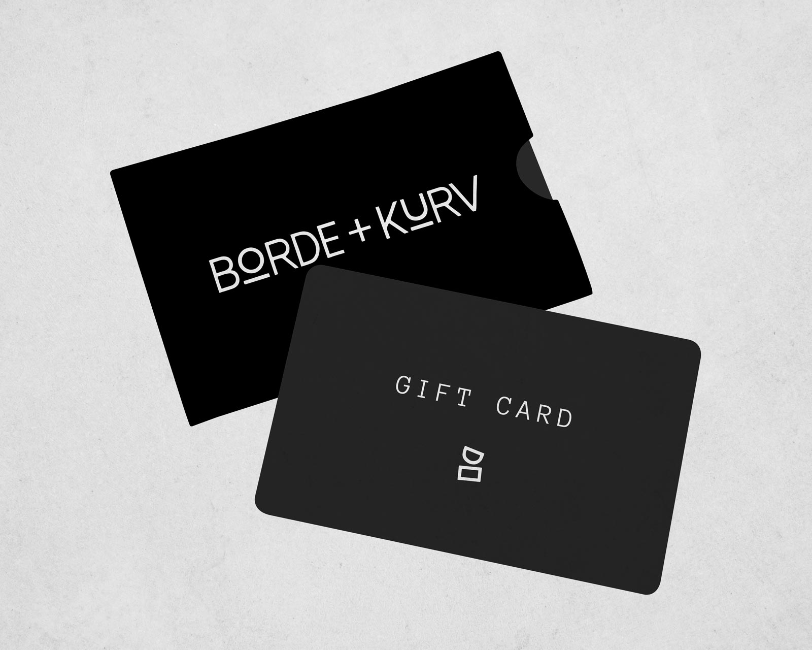 Black gift card with 'BORDE + KURV' branding on a light gray background